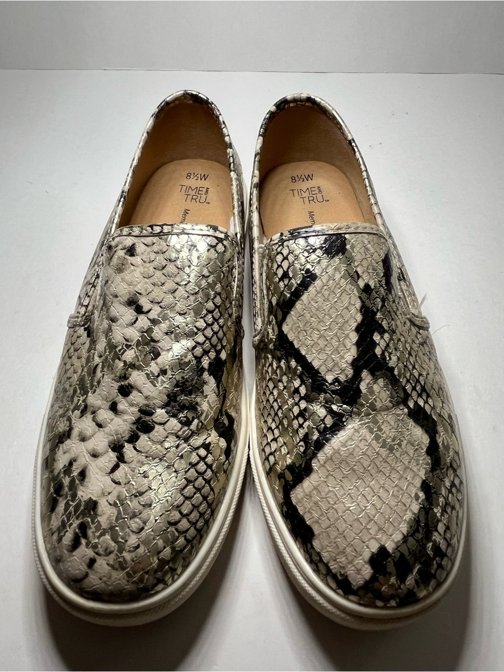 Women’s Faux snake skin slip ons size 8.5 wide